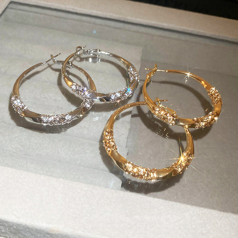 Brincos redondos com zircônias